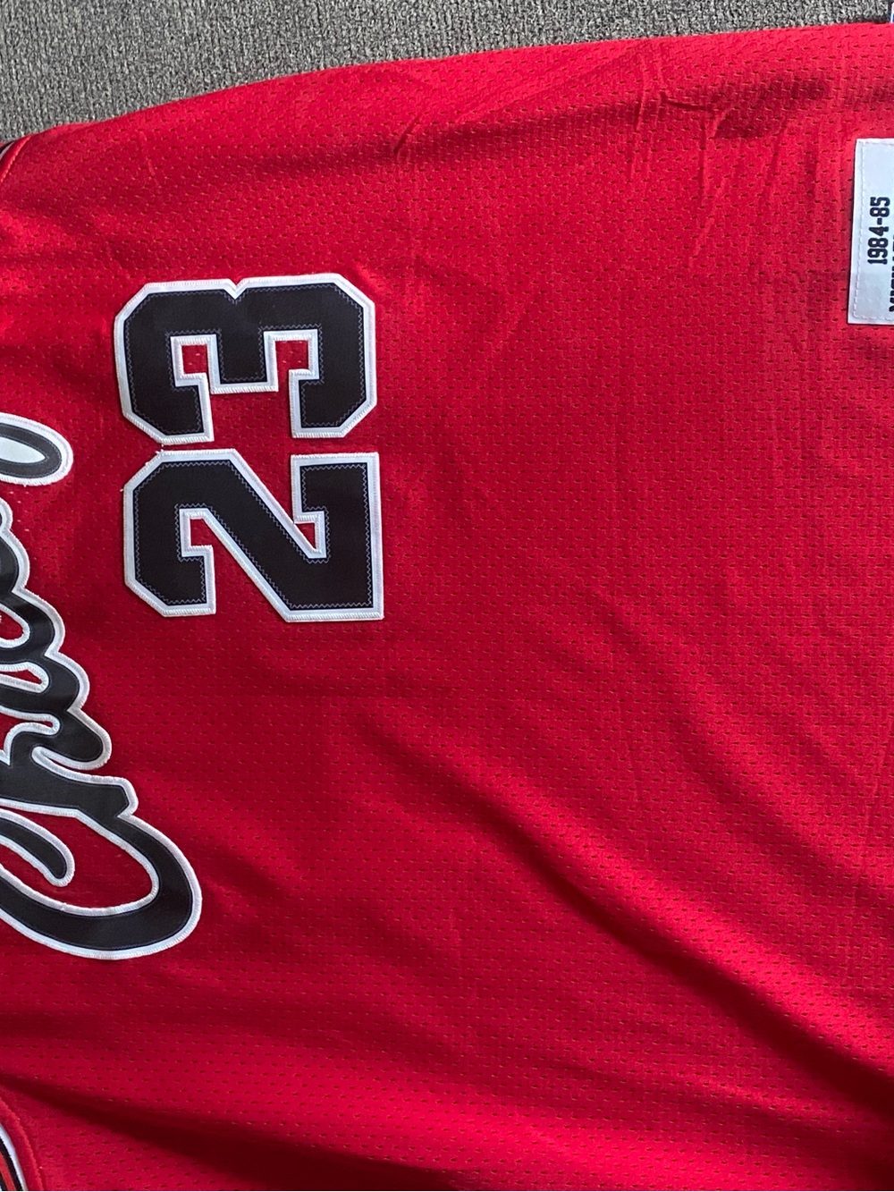 Mitchell & Ness Red Men's Jersey with Black-Trim Number 23